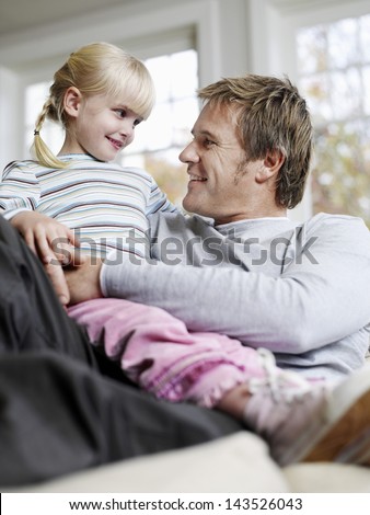 Best of Daughter sits on dads lap